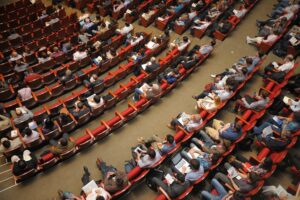 event venue auditorium meeting international conference forum conference listener audience public people sit watching meeting meeting conference conference conference conference conference audience