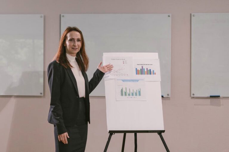 Confident businesswoman delivers a presentation with charts during a corporate meeting.