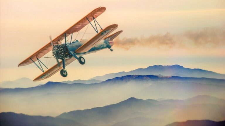 double decker plane mountains fog nature heaven clouds planes antique car flying propeller small planes light aircraft landscape summit top