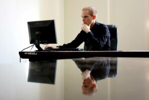 business businessman chair computer desk desktop entrepreneur man monitor reflection thinking work working business business business businessman thinking thinking thinking thinking thinking work