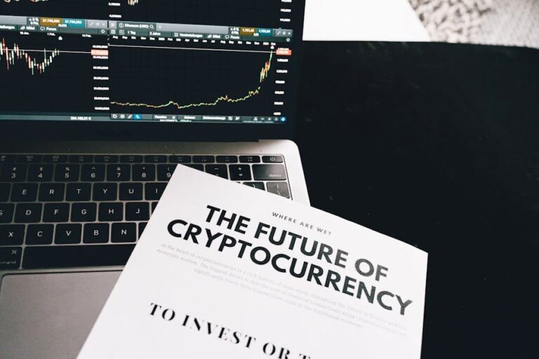 A detailed look at cryptocurrency market trends using a laptop and analytical document.