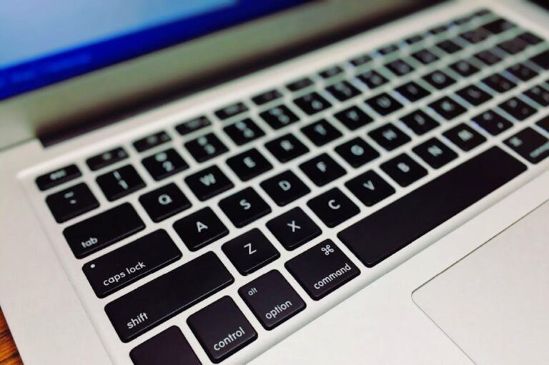 High-resolution close-up of a sleek and modern laptop keyboard, perfect for tech and office themes.