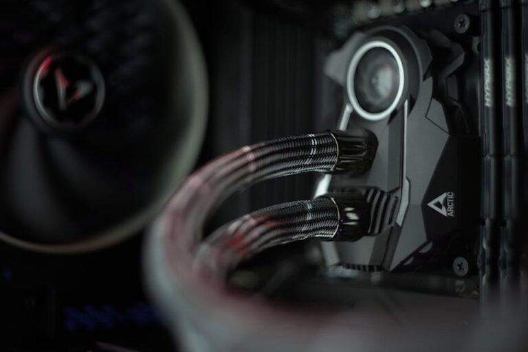 Detailed view of a liquid cooling system inside a desktop computer.