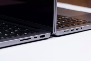 Detailed close-up of two laptops showcasing sleek design and modern technology.