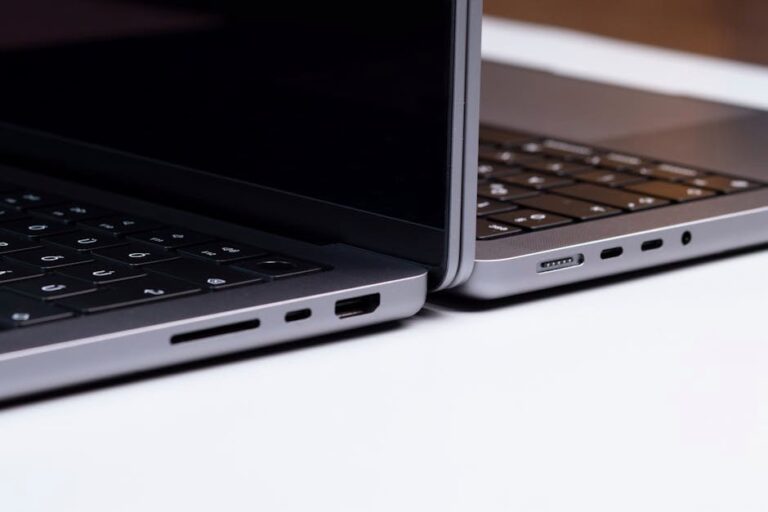 Detailed close-up of two laptops showcasing sleek design and modern technology.