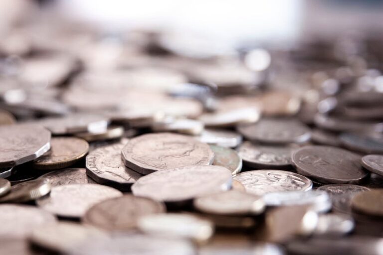 A detailed close-up shot of scattered Australian coins, perfect for finance concepts.